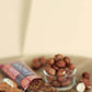 Nussriegel mit Pekannuss, Haselnuss und Schokolade ohne Zuckerzusatz 35 g